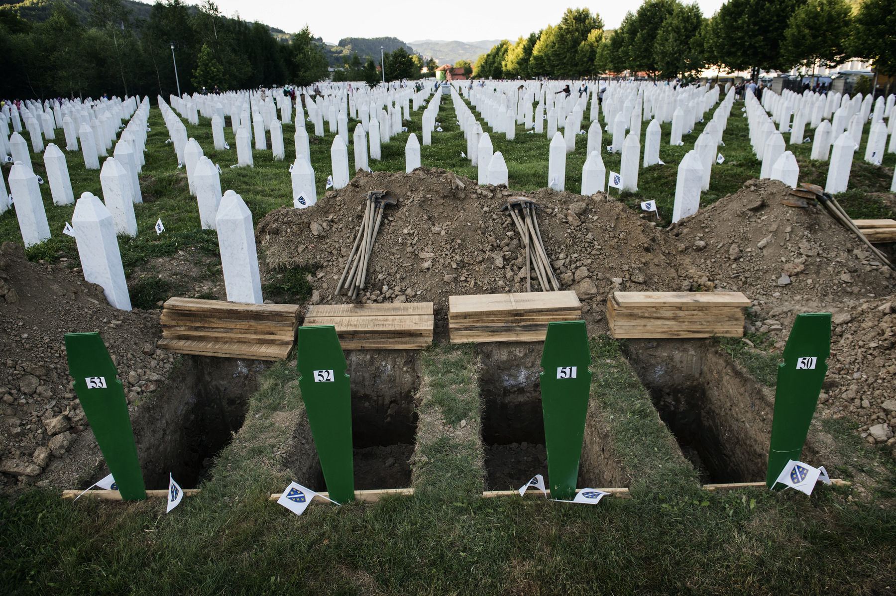 Photographer Anna Tärnhuvud - In these graves a father and his three sons who were killed in July 1995 will be buried.