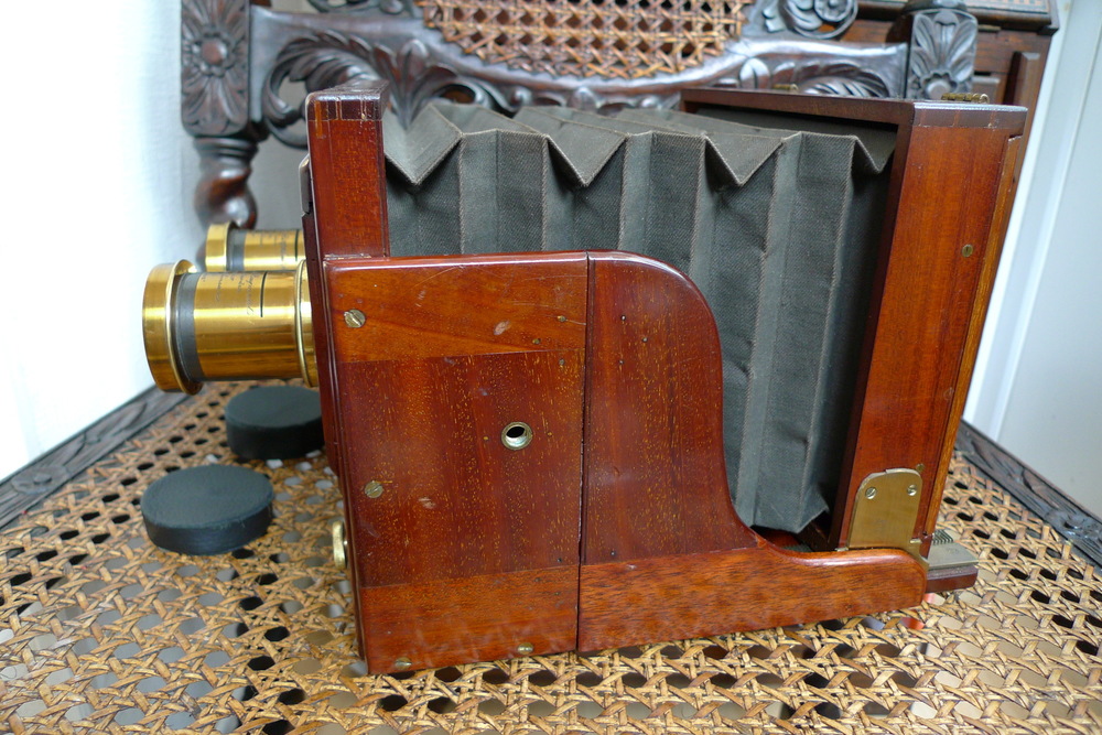 Paper , Shadows and Light. - London Stereoscopic camera , wood and brass circa 1895.In use this camera presents a whole new set of challenges .