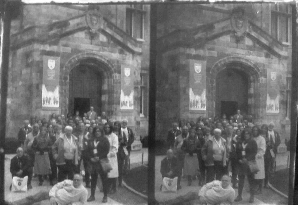 Paper , Shadows and Light. - Delegates of the Stereo photography conference in the court yard of Salvatores college St Andrews. Inverted scan from the Adamsons process Calotype.