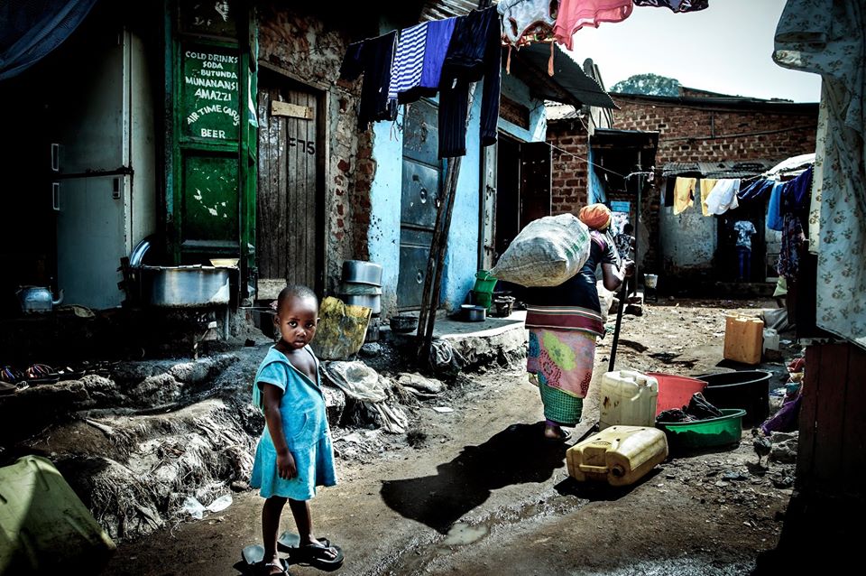 John T. Pedersen Photography - The slum More than 20,000 people live in Katanga, crowded together and often in extreme poverty. Moreen grew up in a rough an poor neighborhood of Katanga with her mum and step dad. She has been living here all her life, with terrible sanitary conditions and open sewers in the streets.