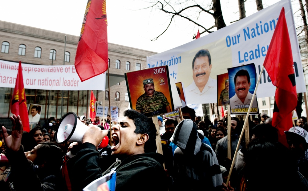 John T. Pedersen Photography - 2009 Demonstration for a ceasefire Some hundred Tamils gathered in front of the Prime Ministers office in the legal demonstration for the demand that Norway must deal quickly to get a ceasefire in Sri Lanka. Several of them were equipped with slogans such as Stop the extinction of Tamils, Get a ceasefire now, We demand active support from Norway and Tamils in need - hear our cry. The police had to block the entrance to the government quarter.