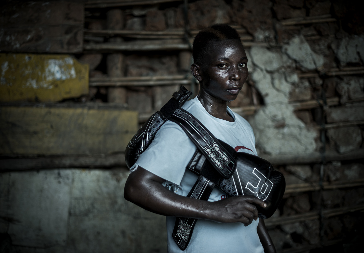 John T. Pedersen Photography - She hopes to do well in all upcoming African tournaments, and again qualify for the World Championship, and then the Olympic Games. There is a major challenge for me says Moreen Ajambo. There are no boxers who are at a higher level than me in Uganda, so I have to leave the country to find these. In countries like Kenya and Tanzania. To do this I need support and money, something that makes it difficult for me to accomplish. The boxing club receives no outside funding. Men’s boxing has a long history in Uganda, but women boxers are often frustrated by the few opportunities to compete at an international level.