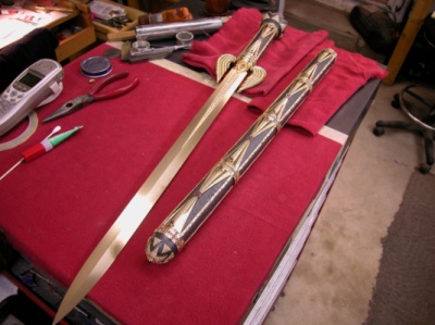The Art of Van Barnett - This semi-finished piece in the photo gives you an idea of where we were headed with this. Remember, it took us 4 years to create this piece. The entire piece is solid 14K gold and Sterling Silver. It is 27.5 inches long.