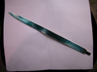 The Art of Van Barnett - 20 inches overall 1/4 inch thick, just cut from a solid bar of 14k spring gold..ready for grinding. Because of the size there was no way to cast this piece, it had to be ground by hand at a very very slow speed.